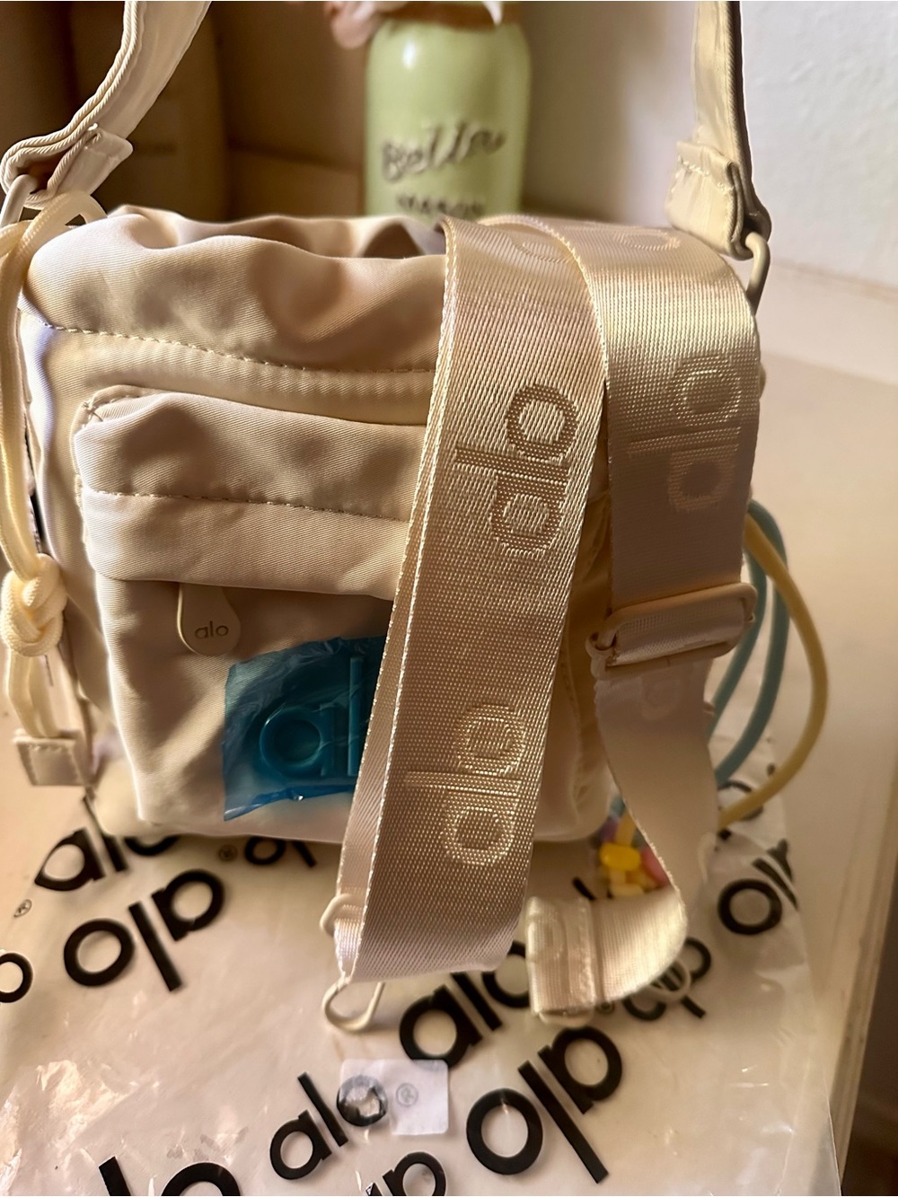 ALO Yoga Cream Drawstring Puffer Mini Crossbody - Picture 8 of 8